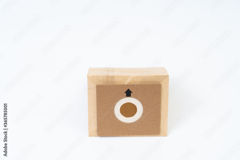 Vacuum cleaner paper bag on white background Vacuum cleaner paper bag on white background