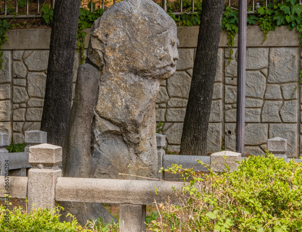 Stone guardian posts in city park Stone guardian posts in city park
