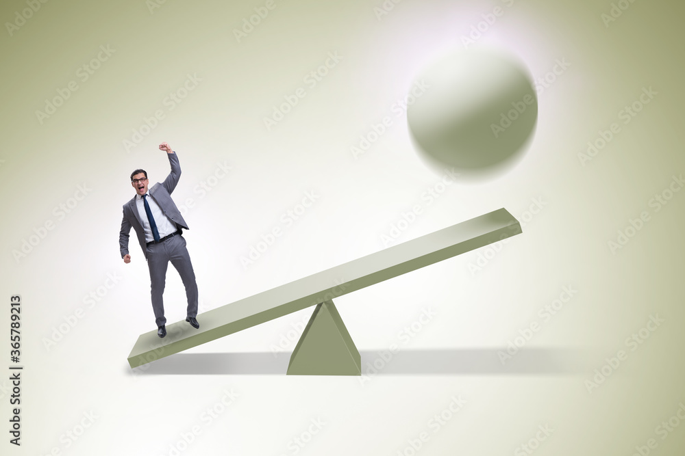 Career progression concept with businessman and seesaw Career progression concept with businessman and seesaw