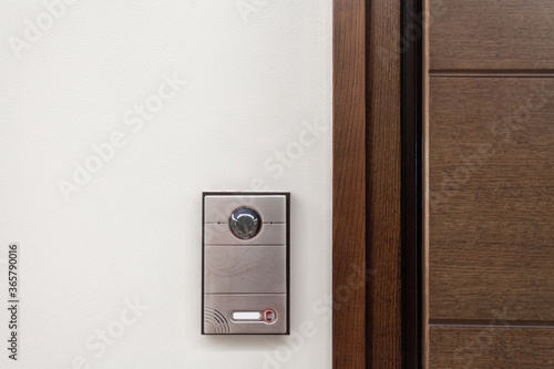 Fototapeta Modern house with contemporary doorbell near door