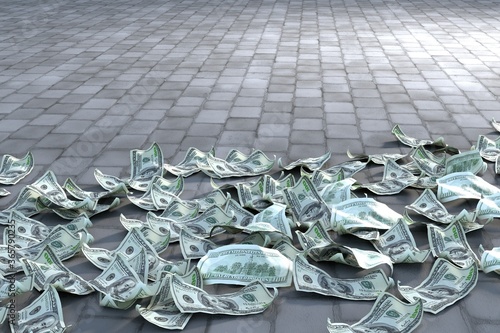 many crumpled 100 dollar bills are scattered on the stone road