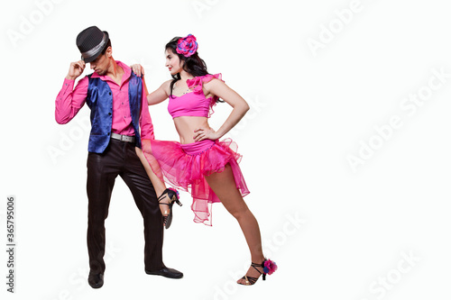 Photography two people dancing. Beautifu young woman and man dancing salsa