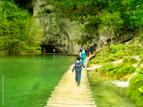 Tourists on walking trail at Plitvice Natural Park in Plitvice  Croatia.   