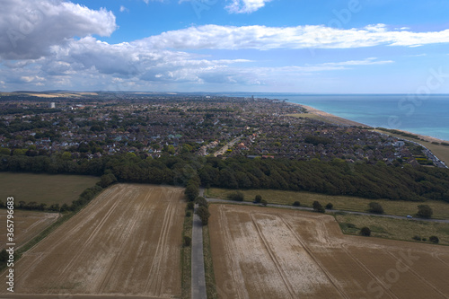 Aerial View along the south coast of England over Goring by Sea with the West Sussex town of Worthing in the distance.