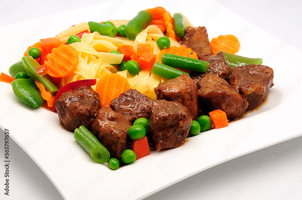 Stew Meat with pasta isolated on white background