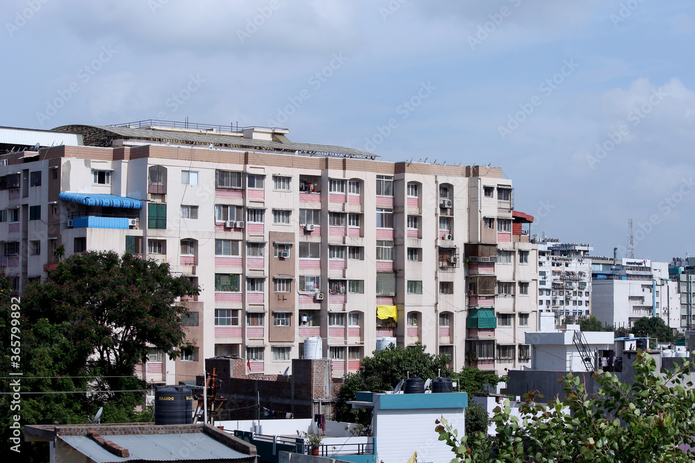 residential buildings and houses in city background in Indore , India