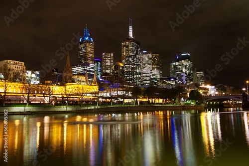 Yarra river with skyscrapers reflection at night, Melbourne, Australia 