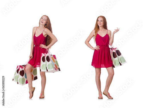 Woman with shopping bags isolated on white