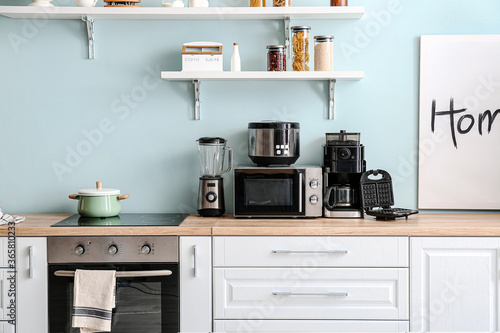 Bild auf Leinwand Interior of kitchen with different household appliances