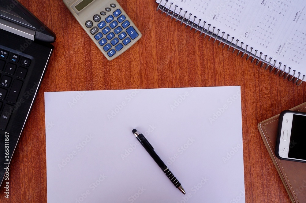 Office desk with paper, pen, smartphone, notebook calendar, laptop and calculator. Business concept. Workplace, home office.
Office desk with paper, pen, smartphone, notebook calendar, laptop and calculator. Business concept. Workplace, home office.