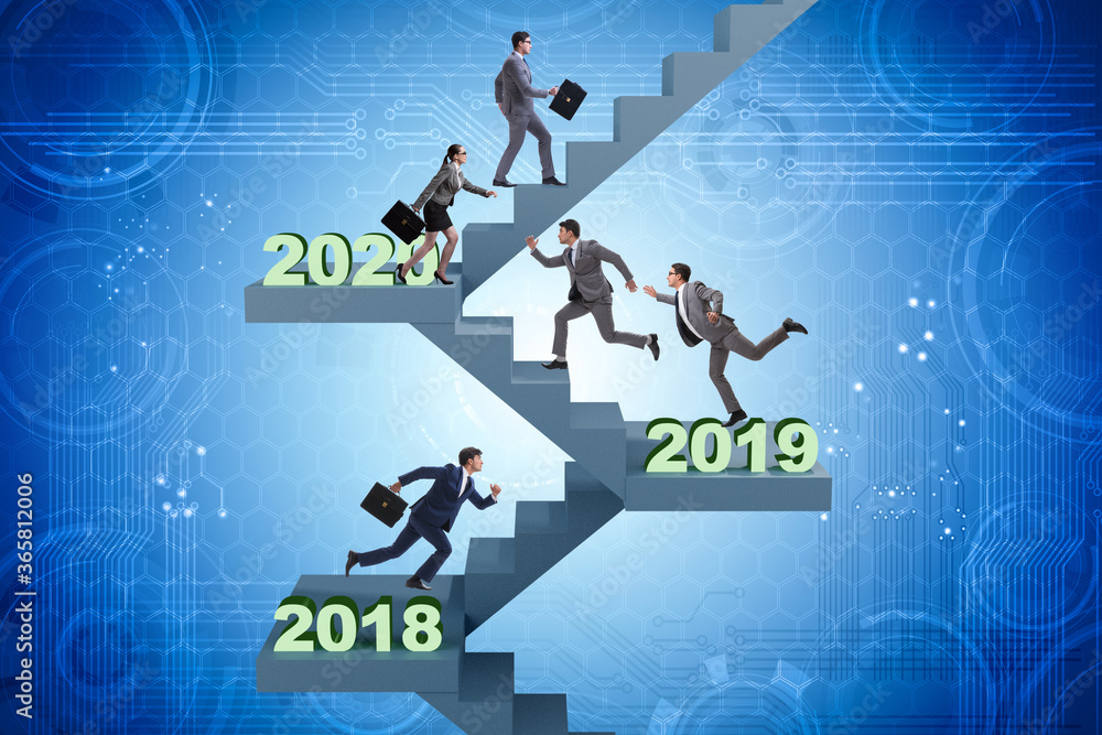 Businessman climbing stairs on yearly basis Businessman climbing stairs on yearly basis