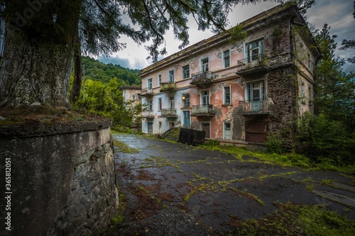 Old abandoned and destroyed building in former Akarmara town, Abkhazia.