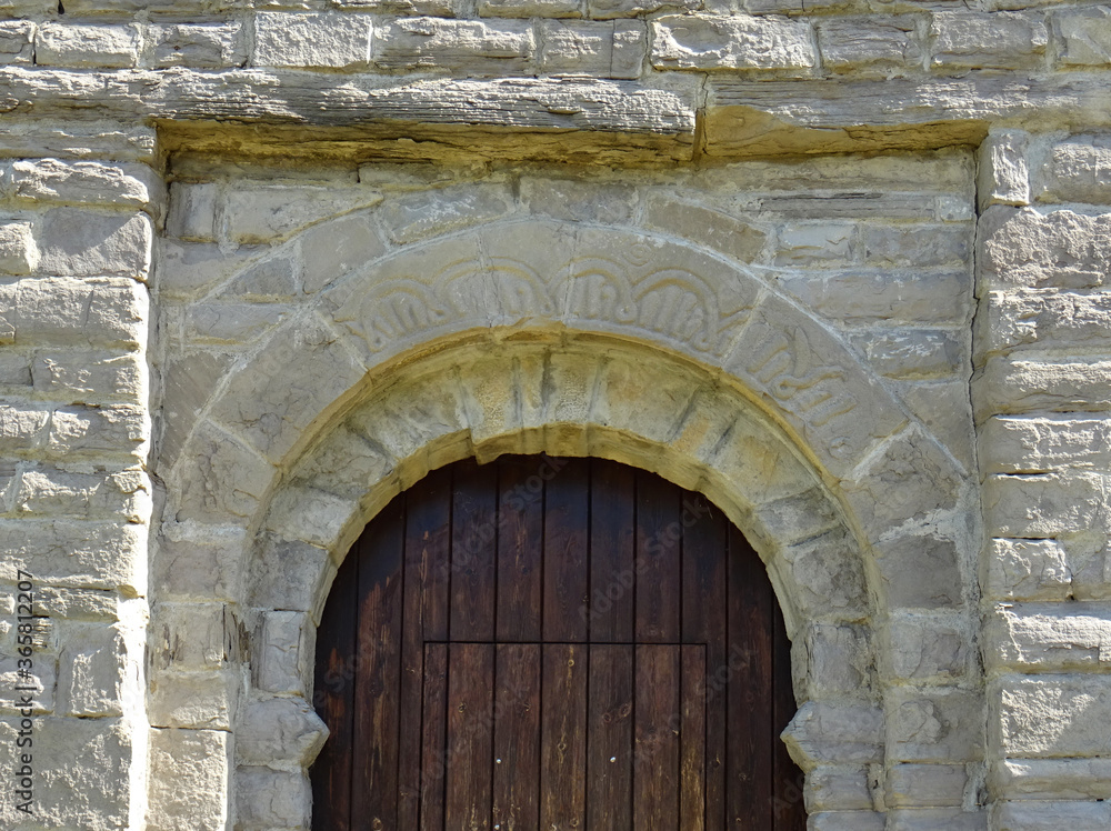 Door detail of the Mozarab Pre-Romanesque or Romanesque Church of San Juan de Busa in the Serrablo Region. 10th-11th century. Aragon. Spain.  
