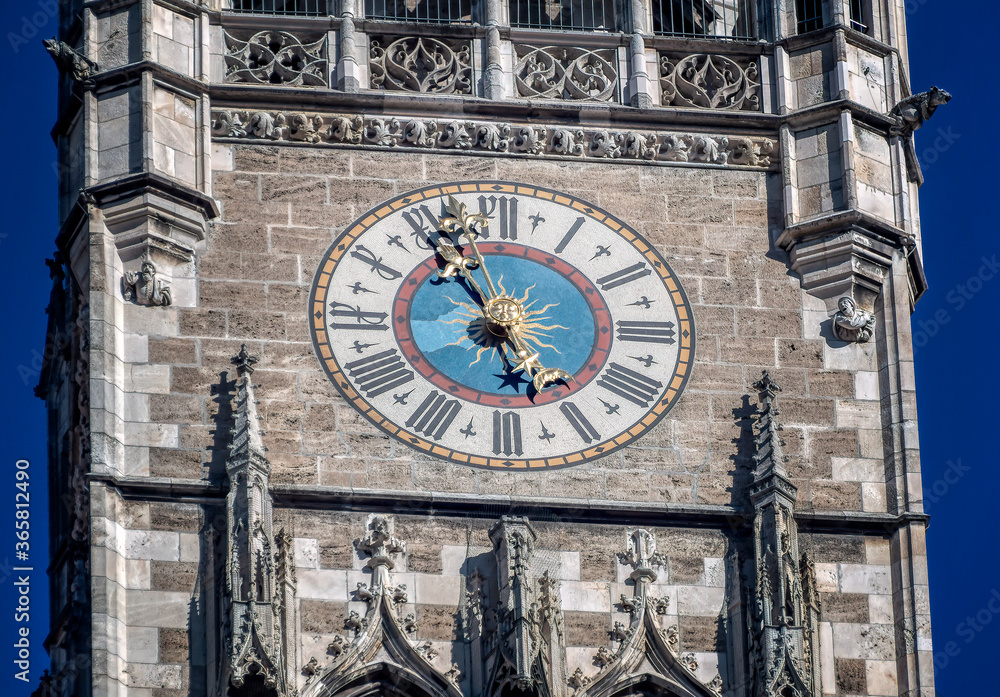 Tower clock at New Town Hall (Neues Rathaus in German) in Munich, Germany. Tower clock at New Town Hall (Neues Rathaus in German) in Munich, Germany.