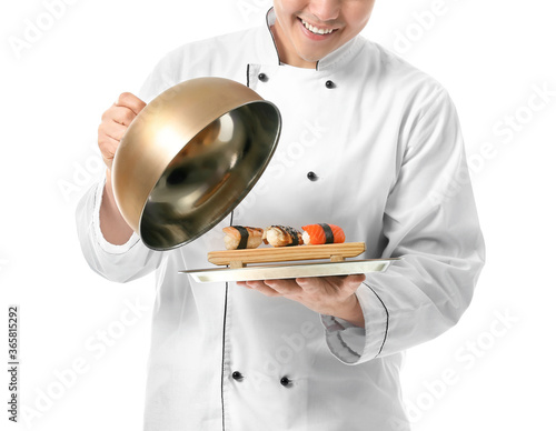 Handsome Asian chef with su...