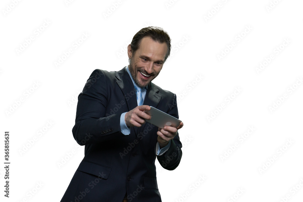Portrait of smiling man using smartphone isolated on white background. Laughing joyful man with mobile phone. Portrait of smiling man using smartphone isolated on white background. Laughing joyful man with mobile phone.