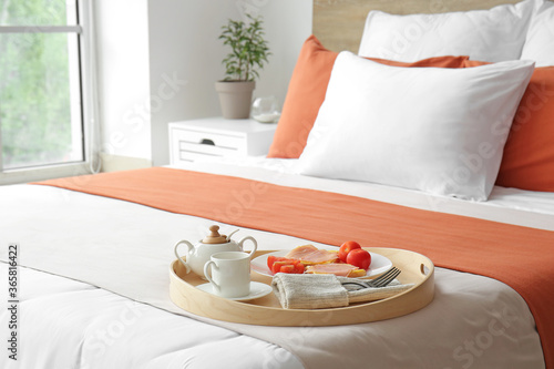 Tray with tasty breakfast o...