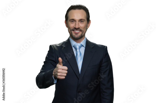 Happy businessman showing thumb up. Successful middle-aged man isolated on white background.