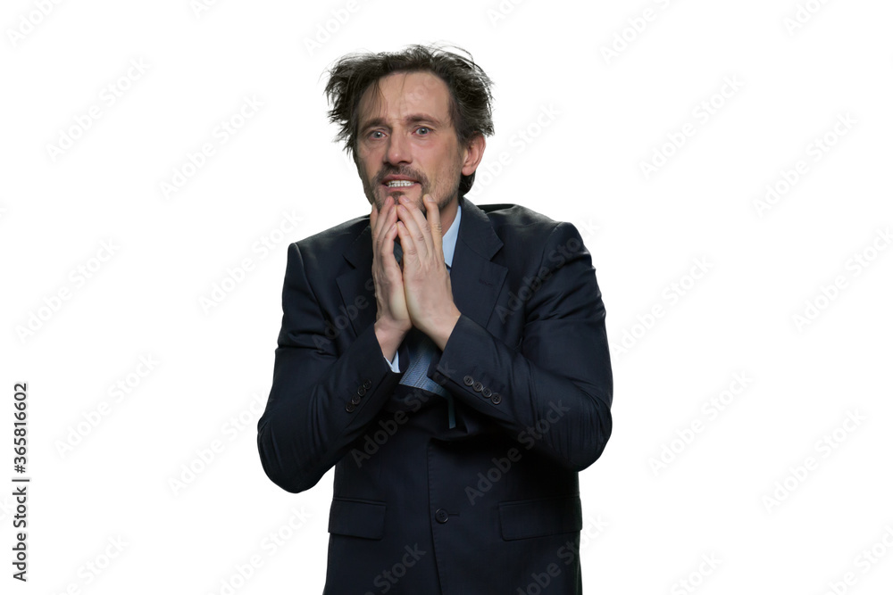 Weary middle-aged boss has problems. Unhappy man in suit isolated on white background. Weary middle-aged boss has problems. Unhappy man in suit isolated on white background.