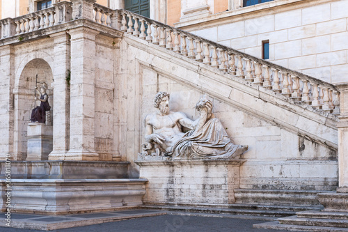 ROME, ITALY - 2014 AUGUST 18. Sculpture in front of stairs of Palazzo Senatorio at Piazza del Campidoglio.