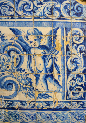 Ornamental old typical tiles from Portugal called "azulejos" made with colored ceramic tiles, who decorates the houses in Lisbon, Portugal
