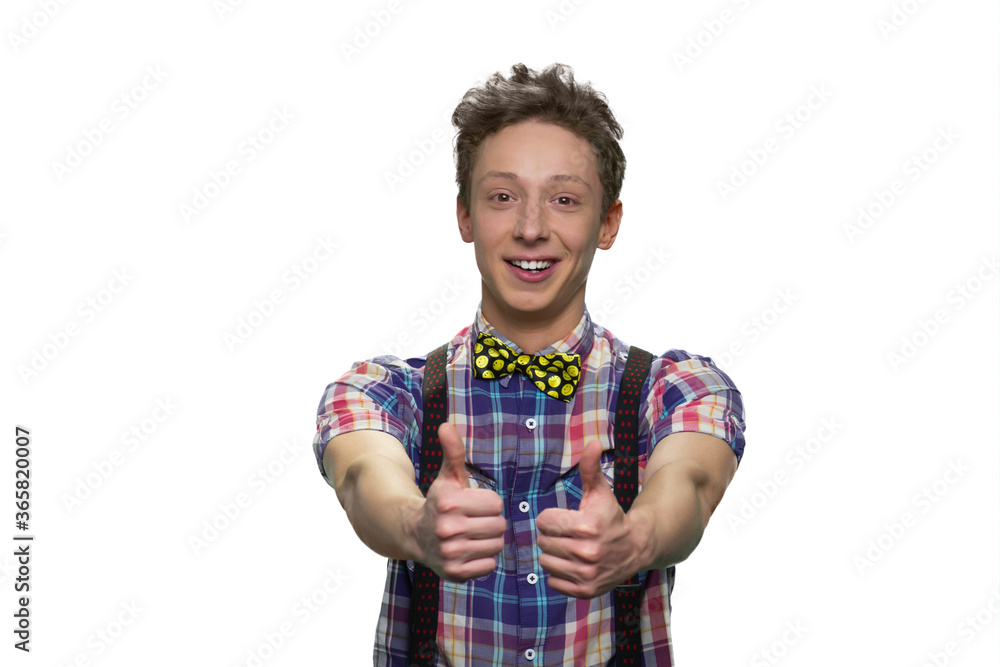 Happy cheerful teenager's showing two thumbs up. Isolated on white background. Happy cheerful teenager's showing two thumbs up. Isolated on white background.