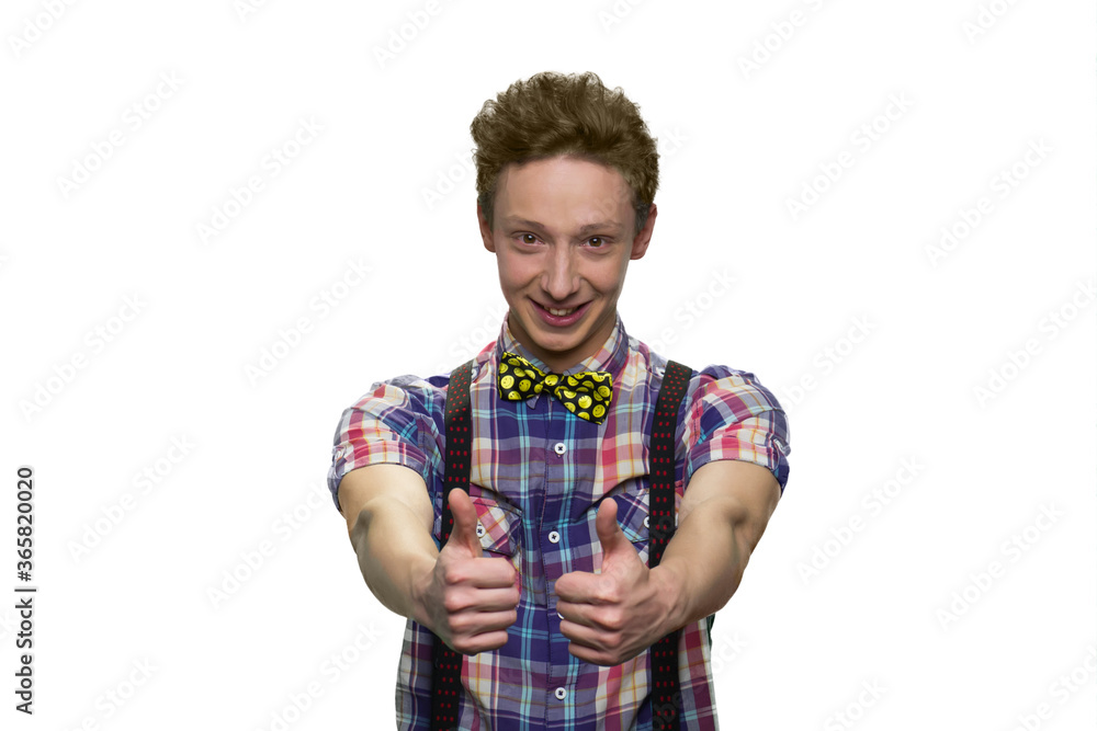 Happy male teenager's showing thumbs up with both hands. Isolated on white background. Happy male teenager's showing thumbs up with both hands. Isolated on white background.