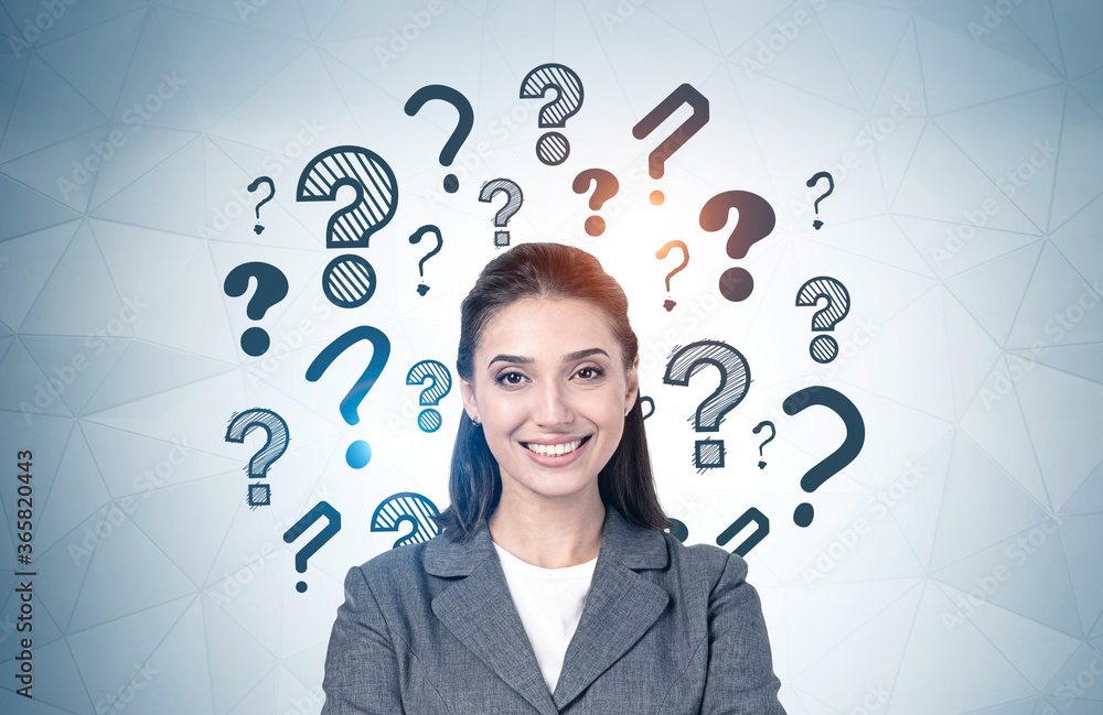 Smiling young woman, question marks Smiling young woman, question marks