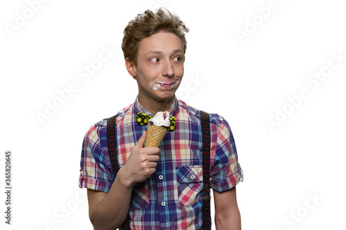 Obraz na płótnie Portrait of sloppy teenager with ice-cream