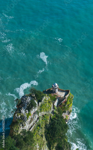 Lighthouse of el Caballo, Monte Buciero.  Santoña, Victoria and Joyel Marshes Natural Park, Cantabria, Spain, Europe photo