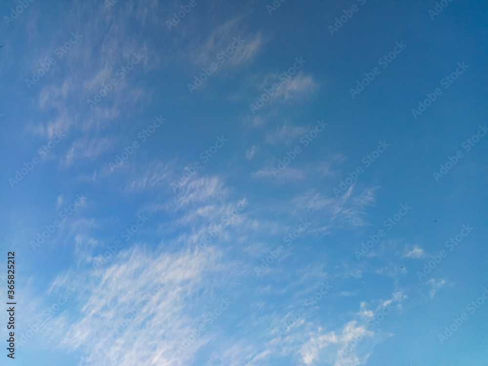 Clear sky with white clouds for a background