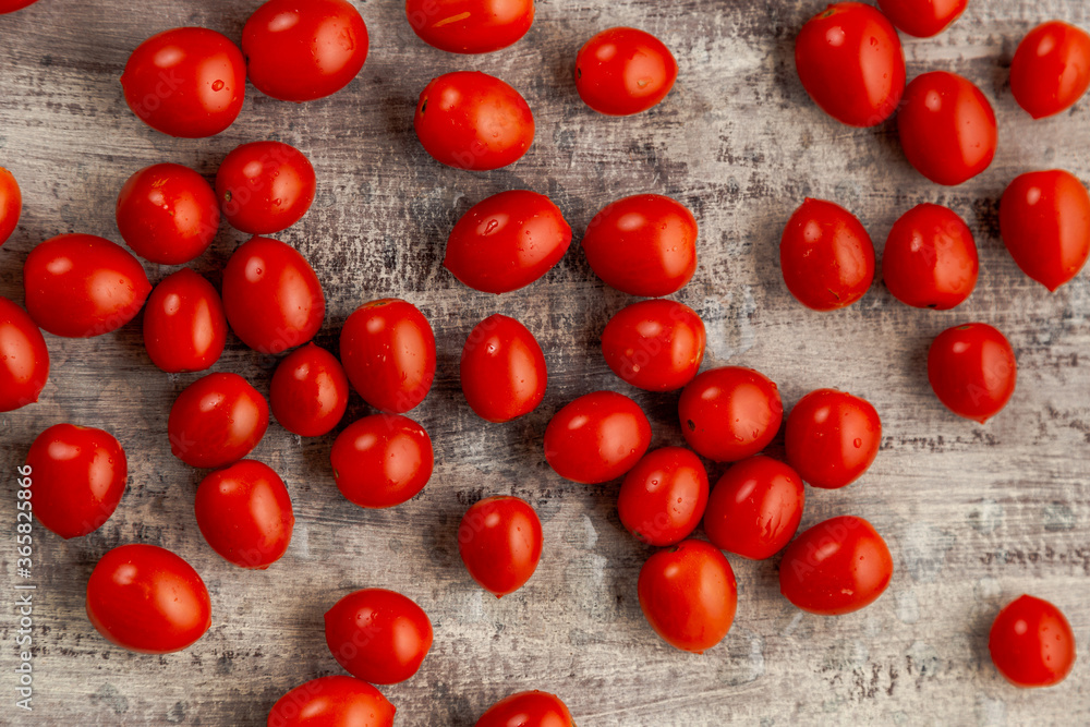 cherry tomatoes on a wooden table cherry tomatoes on a wooden table