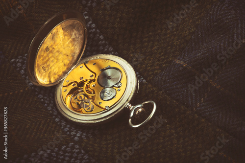 vintage pocket watch with gold mechanism 