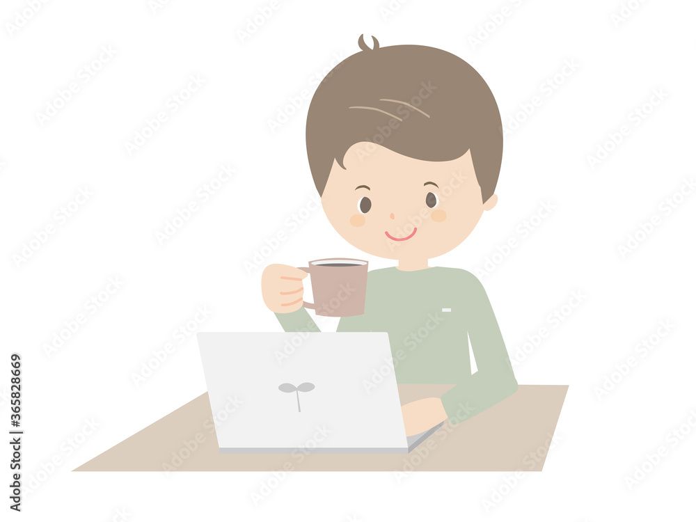 Young man drinking coffee while looking at a laptop. Young man drinking coffee while looking at a laptop.