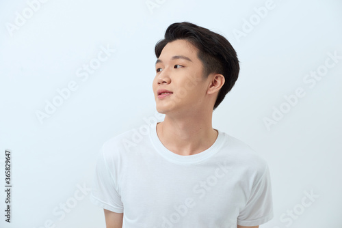 Pensive man smiling - isolated over a white background
