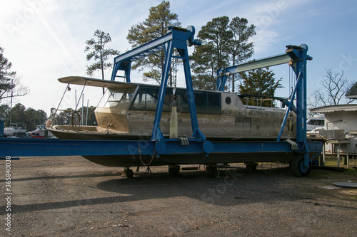 An old antique boat in repair yard in St. Georges Island, Maryland.