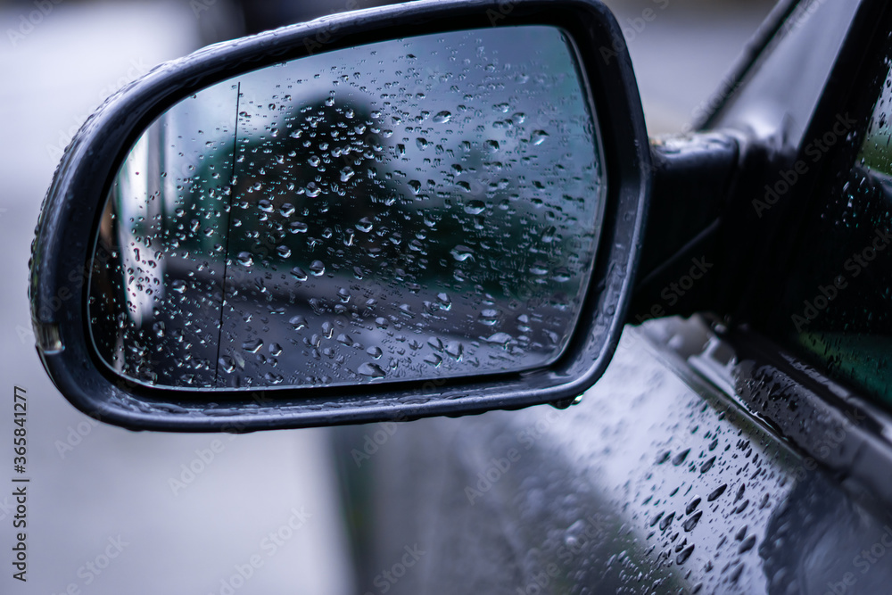 wet car wing mirror wet car wing mirror