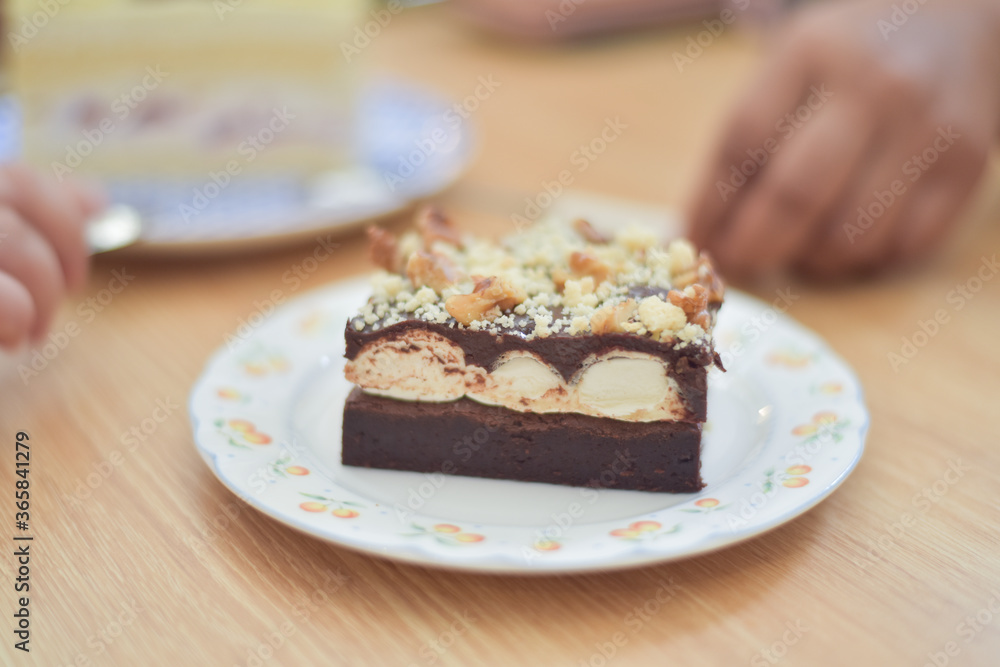 People eating dessert in coffee.