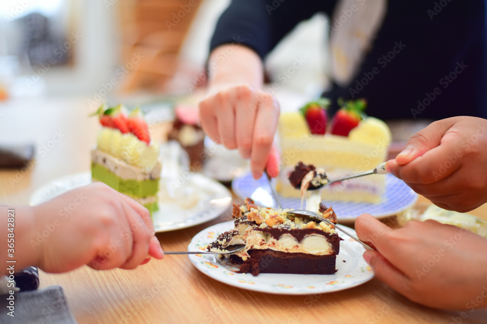 People eating dessert in coffee. People eating dessert in coffee.