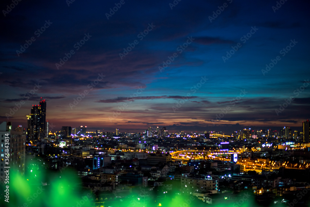 panoramic high-angle evening background of the city view,with natural beauty and blurred sunsets in the evening and the wind blowing all the time,showing the distribution of city center accommodation panoramic high-angle evening background of the city view,with natural beauty and blurred sunsets in the evening and the wind blowing all the time,showing the distribution of city center accommodation