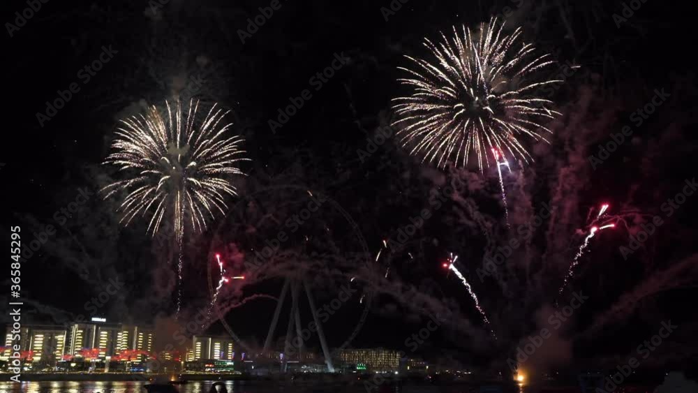 fireworks in Dubai on a background of bluewaters. water chanal fireworks in Dubai on a background of bluewaters. water chanal