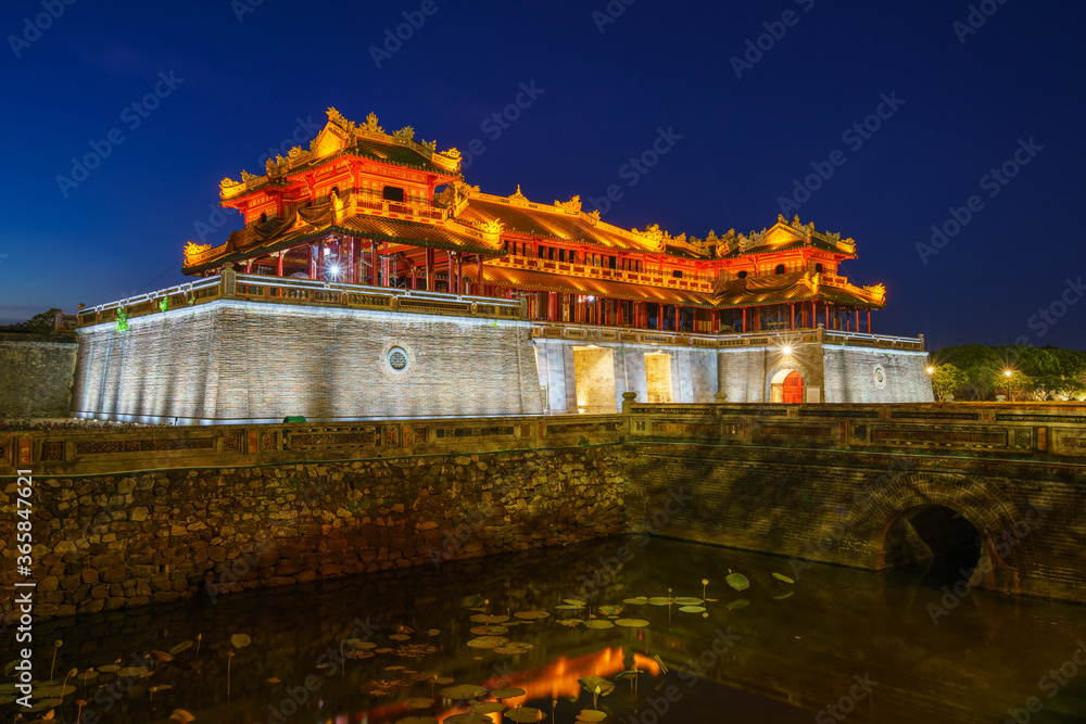 Ngo Mon gate - the main entrance of forbidden Hue Imperial City in Hue city, Vietnam, at night