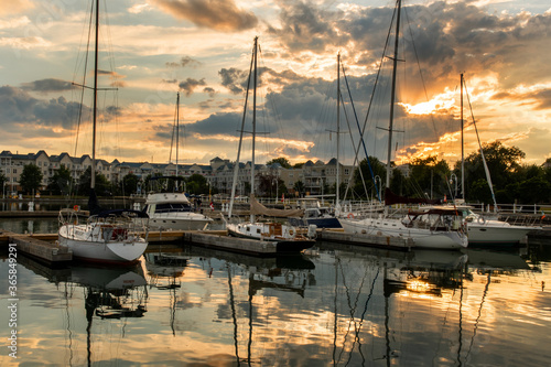 pleasure boats in Cobourg docks in dramatic sunset Cobourg Ontario Canada