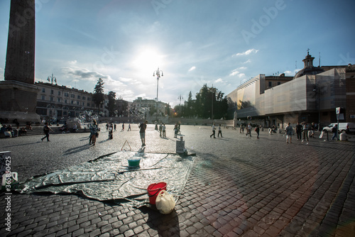 People and bubbles in Piazza del Popolo, Rome