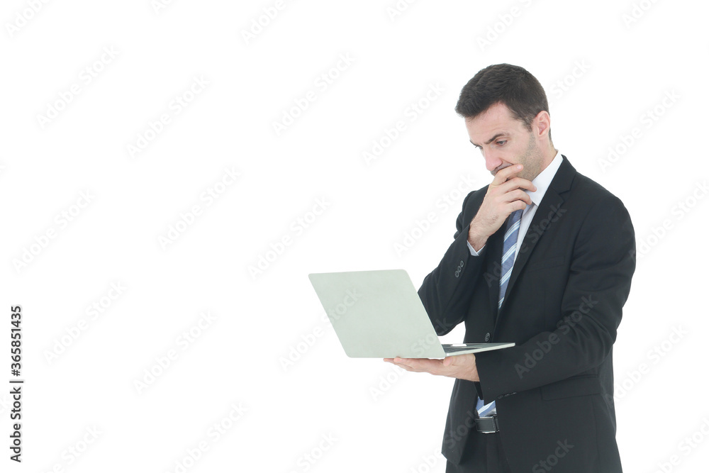 Successful and handsome businessman in a suit smiling with hand holding notebook. He serious in working on a laptop isolated on white background. Copy space Successful and handsome businessman in a suit smiling with hand holding notebook. He serious in working on a laptop isolated on white background. Copy space