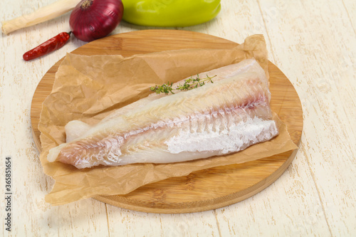 Tableau sur toile Pollack fillet raw ready for cooking