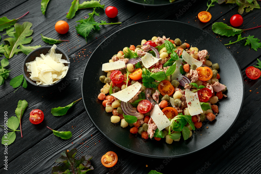 Mini potato gnocchi tricolour with tomato, spinach, Seasonal salad leaves and parmesan cheese Mini potato gnocchi tricolour with tomato, spinach, Seasonal salad leaves and parmesan cheese