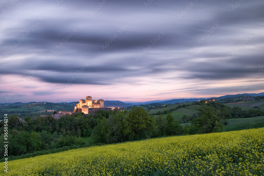 Beautiful castle photographed at the last sunset lights a little cloudy