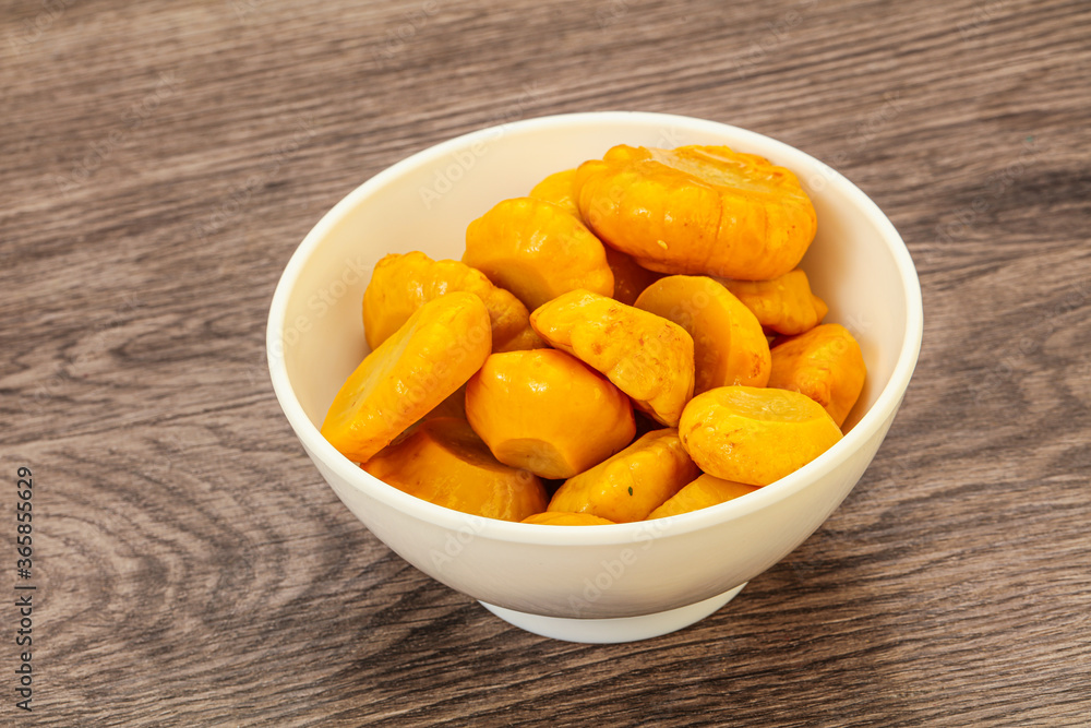 Marinated yellow patisson in the bowl Marinated yellow patisson in the bowl