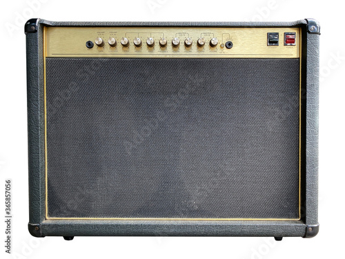 Isolated black leather and gold control panel vintage electric guitar British style amplifier on white background with clipping path. Popular amp in rock metal music. front view photo.